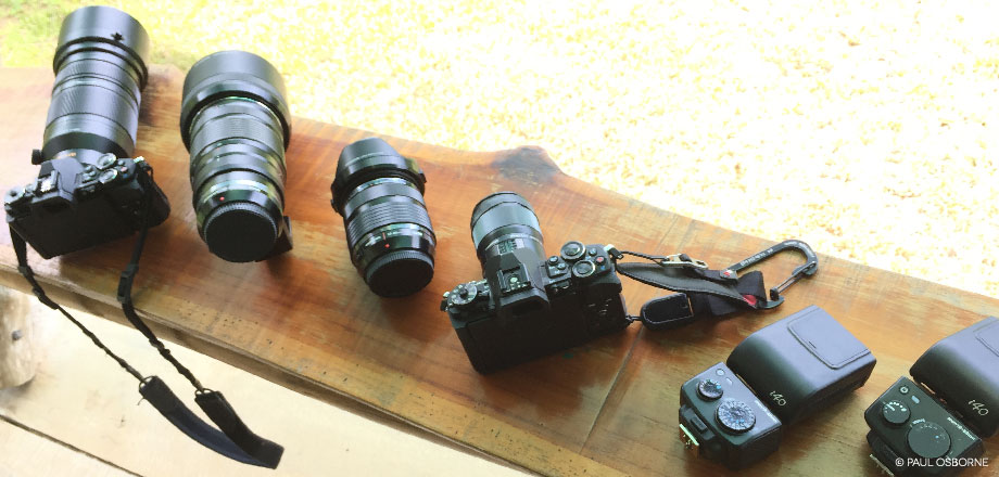 A guests cameras are inspected before a guided tour through Ecoturístico La Tarde's primary rainforests. Osa Peninsula, Costa Rica